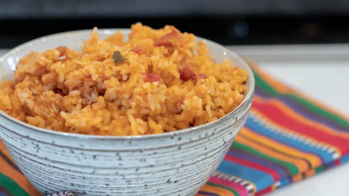 Close up picture of a bowl of Mexican rice.