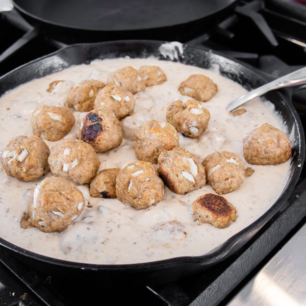 Make classic Swedish meatballs with cream of mushroom soup, milk and sour cream. Great with beef, chicken, turkey or pork meatballs in this creamy sauce gravy.