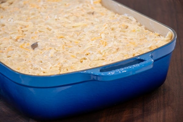 Easy hash brown casserole made with frozen hash browns, cream of mushroom soup, sour cream and cheddar cheese. Oven baked casserole that is a great side dish.