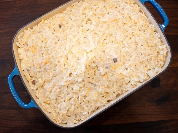 Easy hash brown casserole made with frozen hash browns, cream of mushroom soup, sour cream and cheddar cheese. Oven baked casserole that is a great side dish.