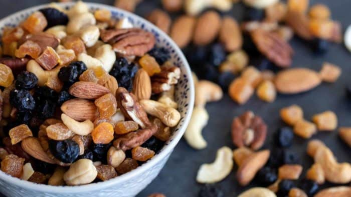 Healthy trail mix of dried fruit and nuts. Pecans, almonds and cashews combine with the dried blueberries and apricots to make a trail mix perfect for snacking!