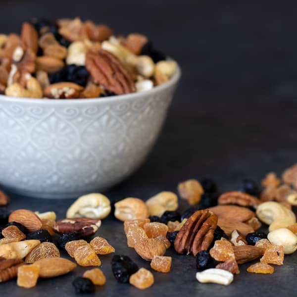 Healthy trail mix of dried fruit and nuts. Pecans, almonds and cashews combine with the dried blueberries and apricots to make a trail mix perfect for snacking!