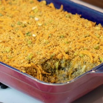 Easy baked cheesy eggplant casserole recipe. How to make with cream of mushroom soup and baked with cheddar cheese, bread crumbs and green onions.