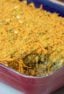 Easy baked cheesy eggplant casserole recipe. How to make with cream of mushroom soup and baked with cheddar cheese, bread crumbs and green onions.