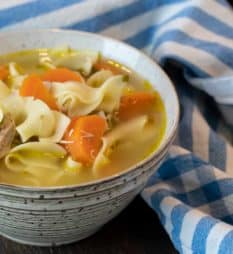 The best chicken noodle soup recipe that is quick and easy. Broth made with roasted or rotisserie chicken carcass. Soup has egg noodles, carrot, celery & onion.