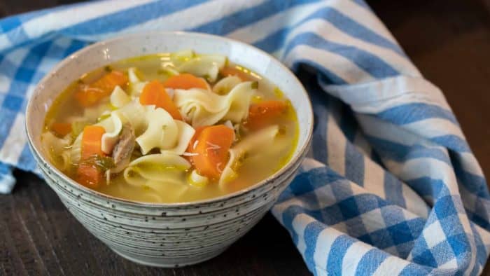 The best chicken noodle soup recipe that is quick and easy. Broth made with roasted or rotisserie chicken carcass. Soup has egg noodles, carrot, celery & onion.