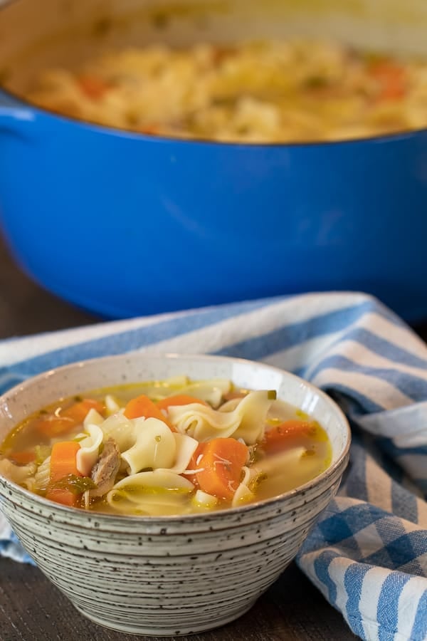 The best chicken noodle soup recipe that is quick and easy. Broth made with roasted or rotisserie chicken carcass. Soup has egg noodles, carrot, celery & onion.