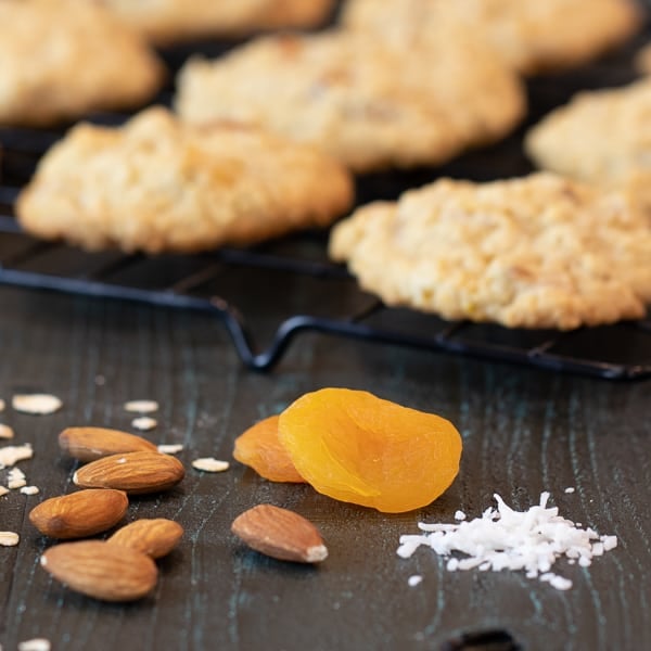 Chewy oatmeal cookie recipe with diced dried apricot, toasted almonds and coconut. Fruity tropical cookie that is a nice change from raisin or chocolate chips.