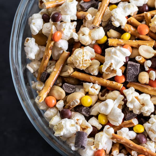 Make a snack mix at home with mini Reese's Pieces, chunks of dark chocolate, peanuts, pretzel sticks and sweet and salty popcorn. Great for movie night, road trips or an after school snack!