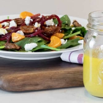 Homemade salad dressing recipe is made with dijon mustard, honey and vinegar. This sweet vinaigrette is perfect for spinach or salad of greens.