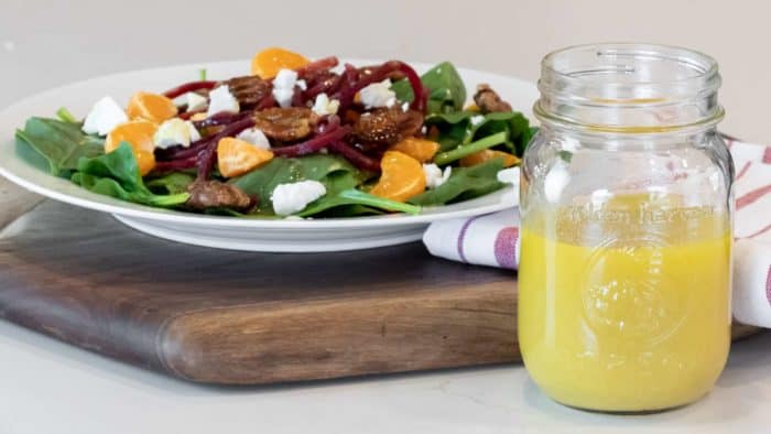 Homemade salad dressing recipe is made with dijon mustard, honey and vinegar. This sweet vinaigrette is perfect for spinach or salad of greens.