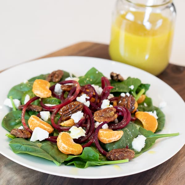 Homemade salad dressing recipe is made with dijon mustard, honey and vinegar. This sweet vinaigrette is perfect for spinach or salad of greens.