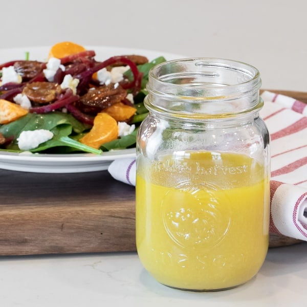 Homemade salad dressing recipe is made with dijon mustard, honey and vinegar. This sweet vinaigrette is perfect for spinach or salad of greens.