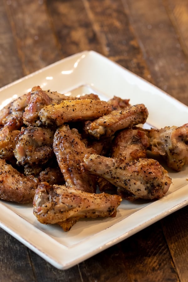 How to cook wings in Air Fryer that are crispy and taste like they are deep fried. Simple instructions for basic salt and pepper chicken wings. Add sauce after for sweet and sticky wings.