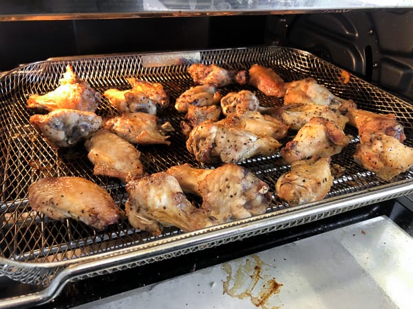 How to cook wings in Air Fryer that are crispy and taste like they are deep fried. Simple instructions for basic salt and pepper chicken wings. Add sauce after for sweet and sticky wings.