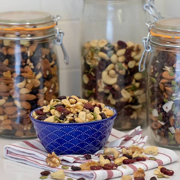 Make your own trail mix at home with a healthy mixture of ingredients. Dried cranberries, raisins, walnuts, cashews, peanuts, pepitas (pumpkin seeds) and sunflower seeds.