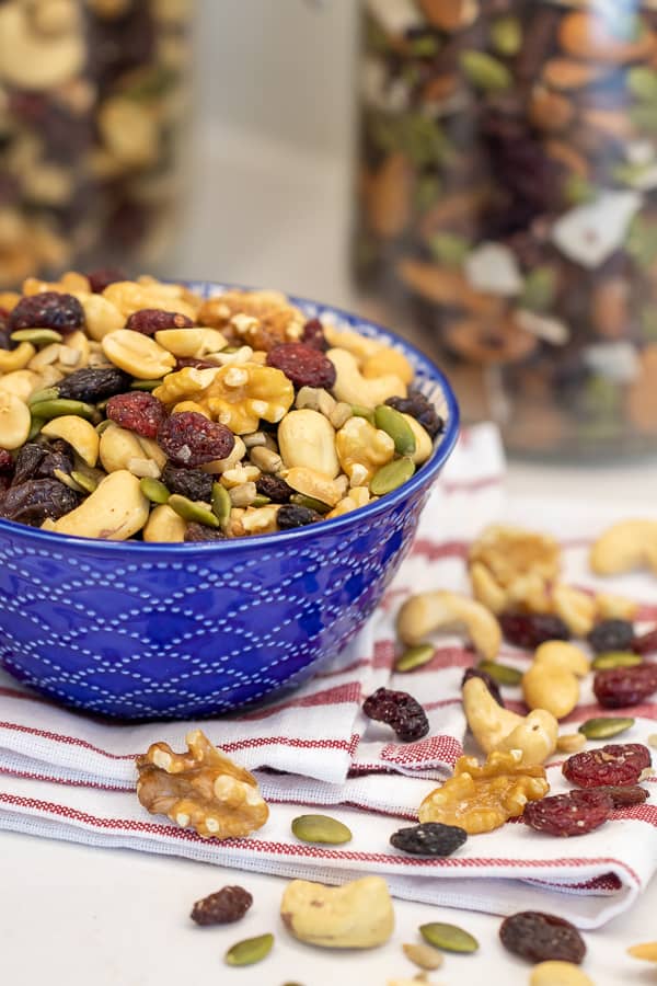 Make your own trail mix at home with a healthy mixture of ingredients. Dried cranberries, raisins, walnuts, cashews, peanuts, pepitas (pumpkin seeds) and sunflower seeds.