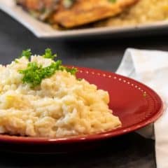 Easy instructions for how to make risotto at home so that it is creamy and tastes just like a restaurant. Made with arborio rice, parmesan cheese, lemon, broth and more.