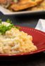 Easy instructions for how to make risotto at home so that it is creamy and tastes just like a restaurant. Made with arborio rice, parmesan cheese, lemon, broth and more.
