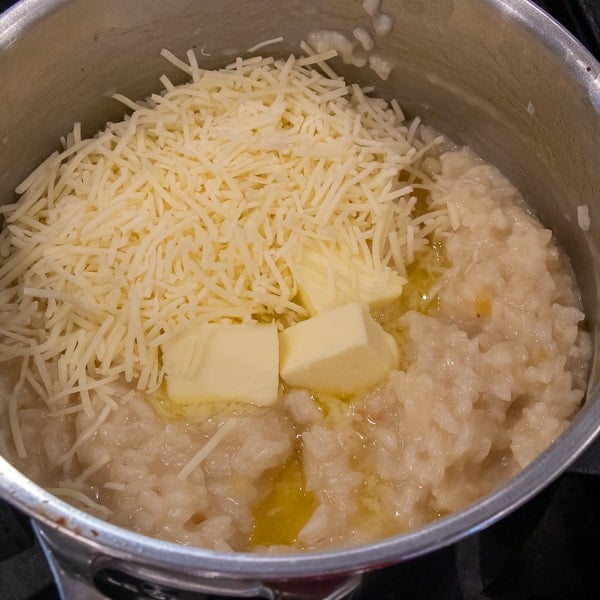 Easy instructions for how to make risotto at home so that it is creamy and tastes just like a restaurant. Made with arborio rice, parmesan cheese, lemon, broth and more.