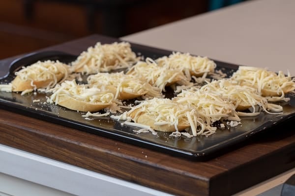 This unique bruschetta has toasted baguettes with melted mozzarella and parmesan. Topped with sautÃ©ed portobello mushrooms and drizzled with balsamic glaze.