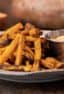 Easy instructions for how to make sweet potato french fries in an air fryer. Crispy and tastes just like deep fried but this recipe uses very little oil. Sweet potatoes make the perfect fries.