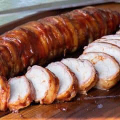 A delicious BBQ recipe of bacon wrapped smoked pork tenderloin with cajun seasoning.
