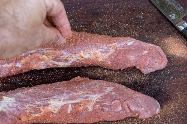 A delicious BBQ recipe of bacon wrapped smoked pork tenderloin with cajun seasoning.