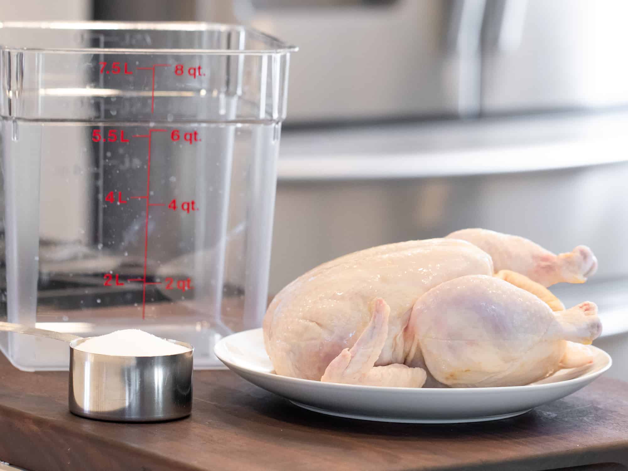 Easy instructions to make a simple brine for a whole chicken including how long to brine and what ingredients to use like salt, sugar, pepper and more.