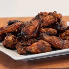Sweet Thai Chili Smoked Chicken Wings Recipe - Simple instructions for how to smoke chicken wings with a delicious rub and a sweet and sticky Thai chili glaze.