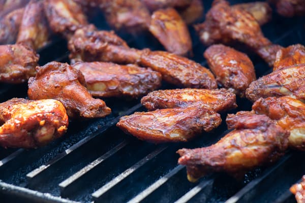 Simple instructions for how to smoke chicken wings with a delicious rub and a sweet and sticky Thai chili glaze.
