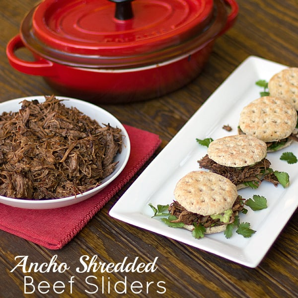 Slow cooked chuck steak with an ancho chili sauce. Cooked in the oven using a braise technique. The beef is shredded and put on a slider bun with avocado guacamole and fresh cilantro.