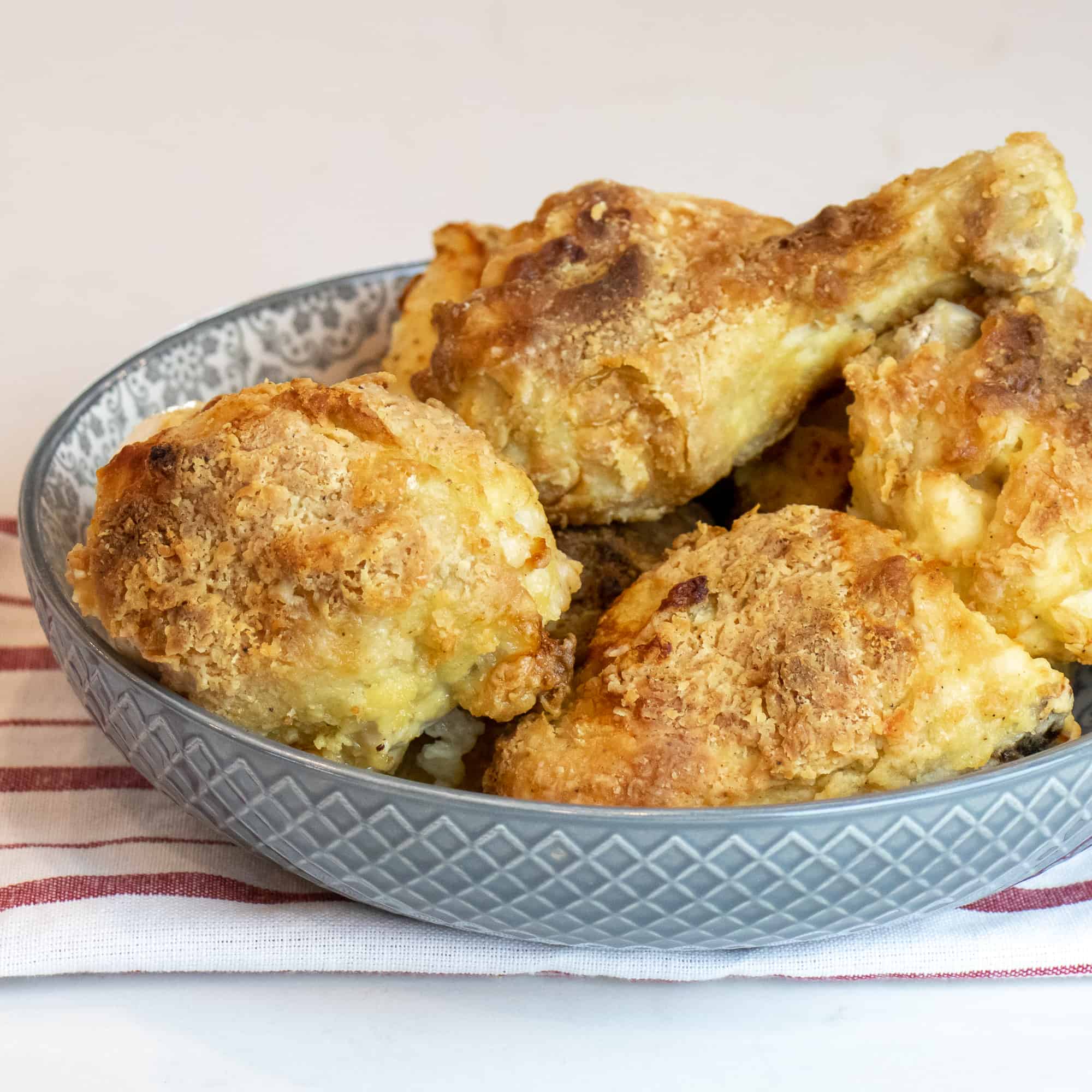 Instructions for how to make fried chicken in an air fryer. Works with toaster oven and other types of air fryer units like Phillips and Instant Pot.