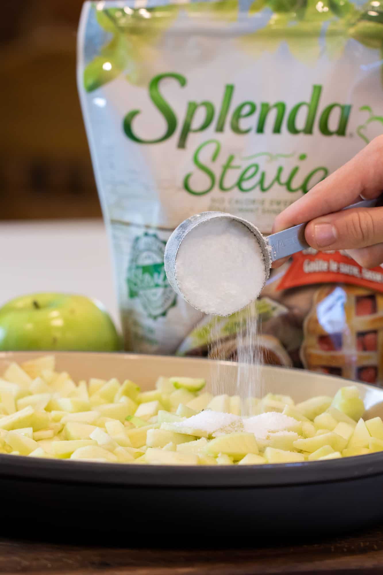 Stir the Splenda Stevia, Flour and Salt with all the diced apples in the casserole dish.