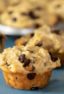 These chocolate chip muffins are a great way to use leftover oatmeal. This very simple recipe yields twelve fresh baked muffins.