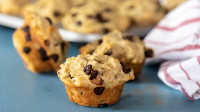 These chocolate chip muffins are a great way to use leftover oatmeal. This very simple recipe yields twelve fresh baked muffins.