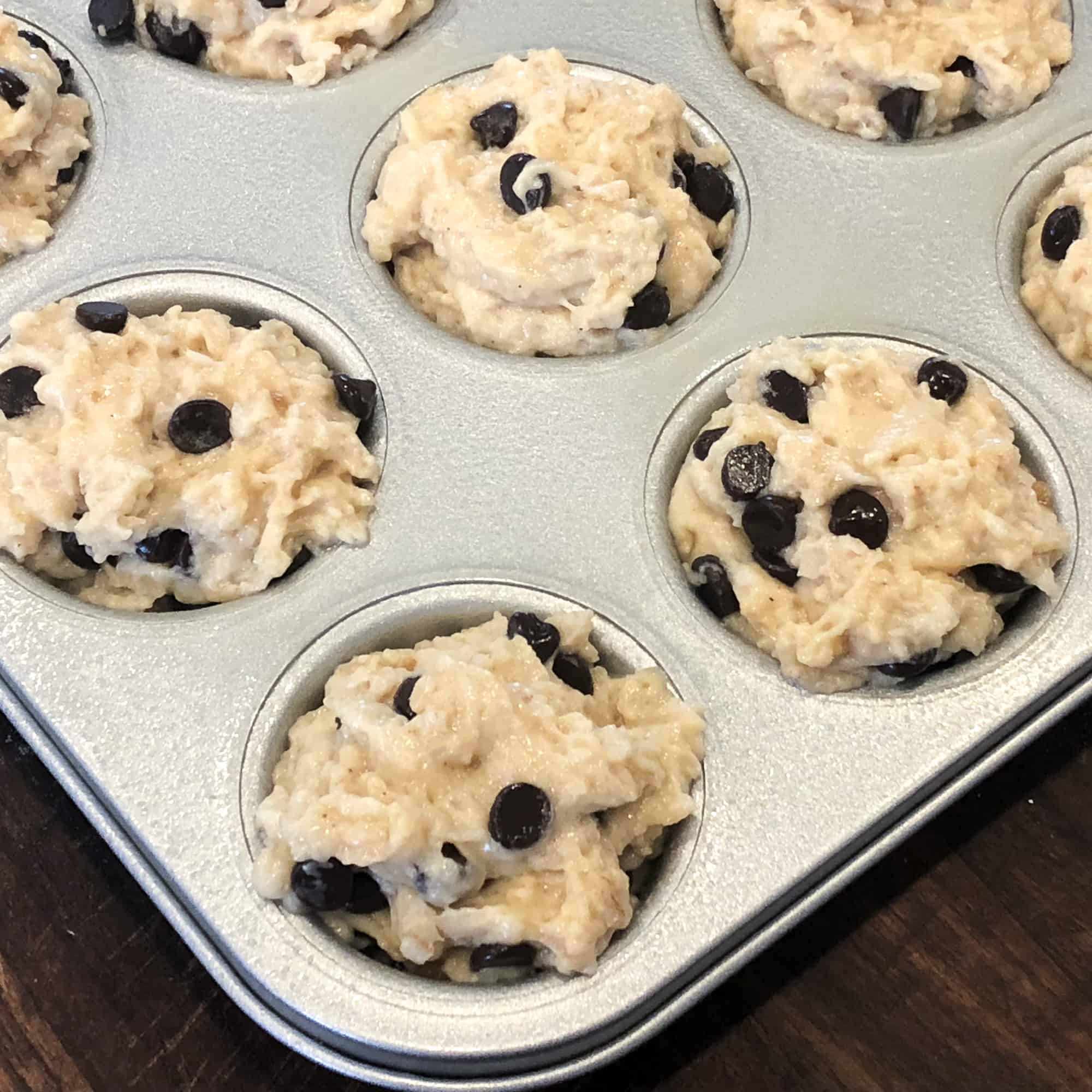 Scoop into greased muffin tins