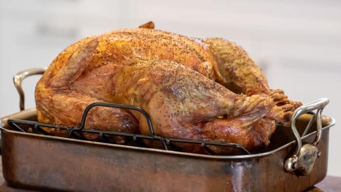 Instructions for how to cook an unstuffed turkey in an oven. Recipe and details for how long to roast a turkey.