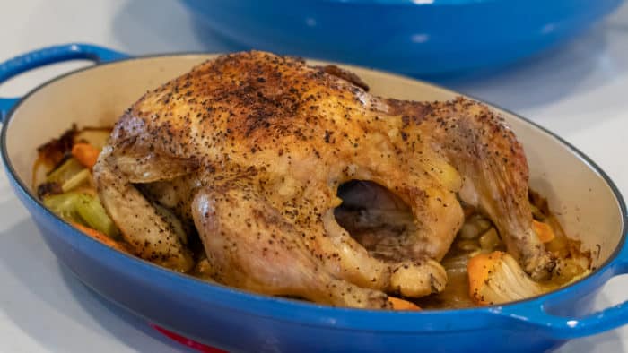 Simple recipe and instructions for how to roast a whole chicken. Tender and juicy chicken that is baked in the oven.