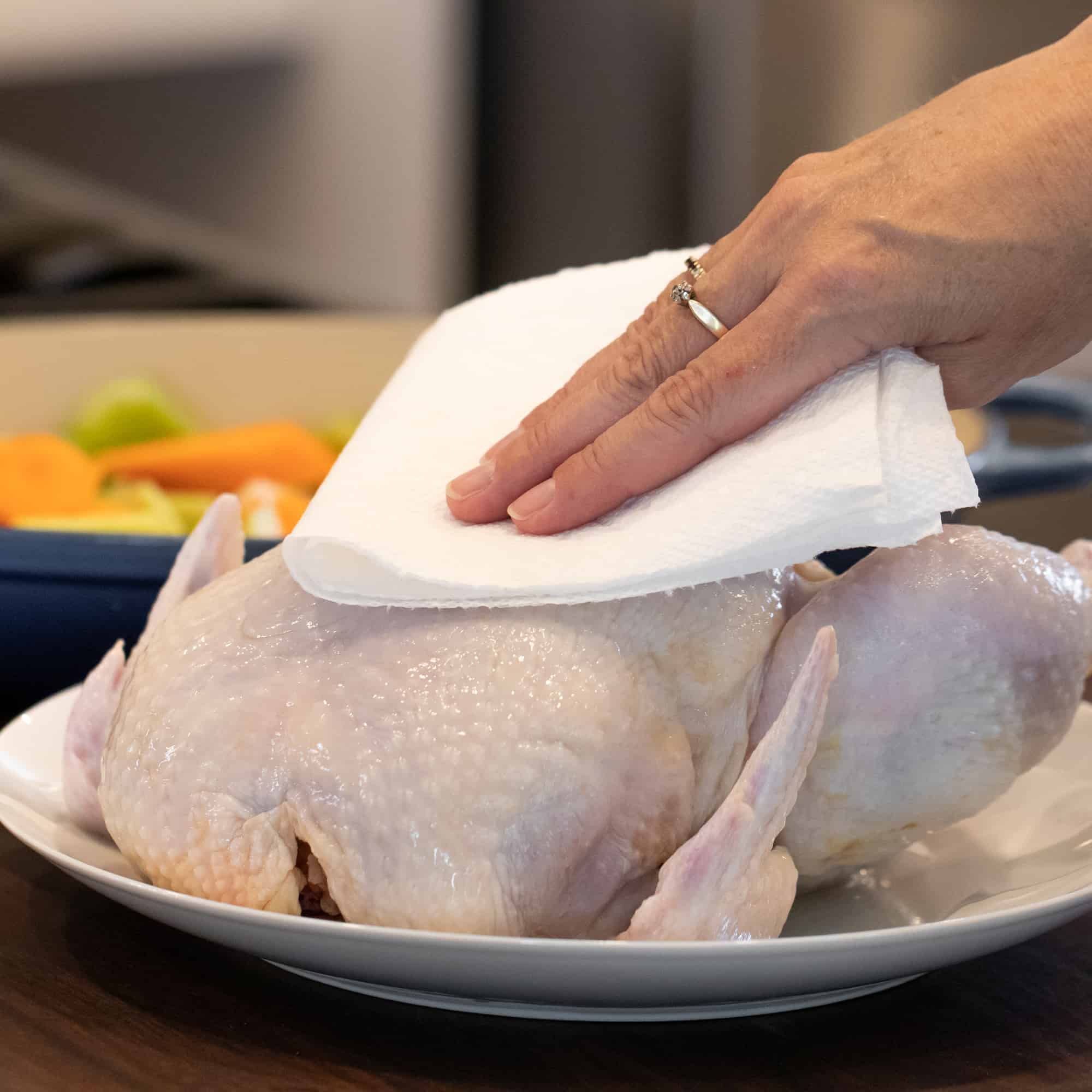 Pat dry the chicken with a paper towel