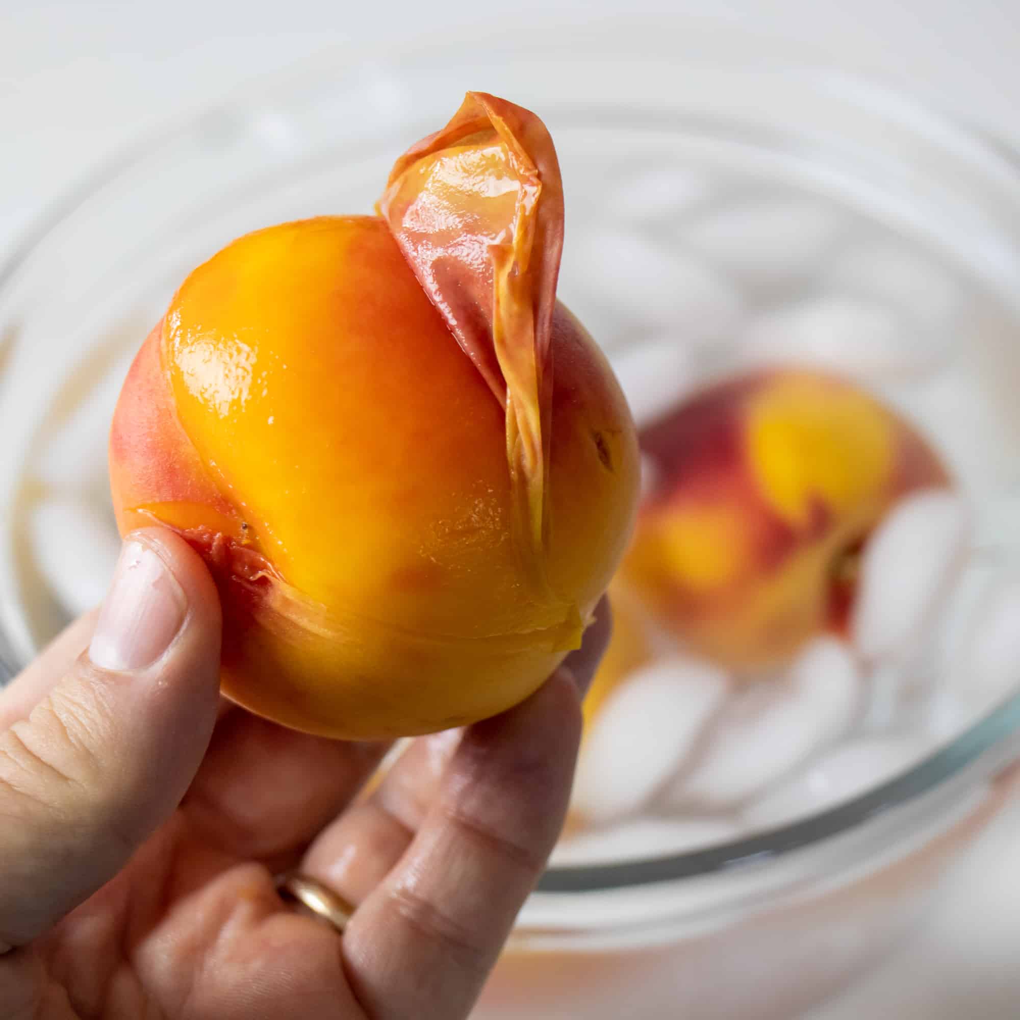 Peel the peach skin off