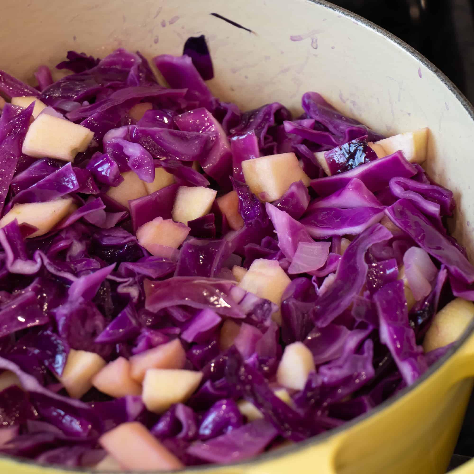 The cabbage and apples have been simmering for about 15 minutes and you can see the they are starting to soften.