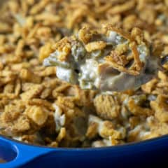 Traditional green bean casserole recipe made with cream of mushroom soup and crispy fried onions. The best holiday Thanksgiving side dish.