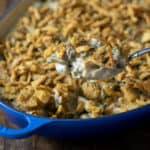 Traditional green bean casserole recipe made with cream of mushroom soup and crispy fried onions. The best holiday Thanksgiving side dish.