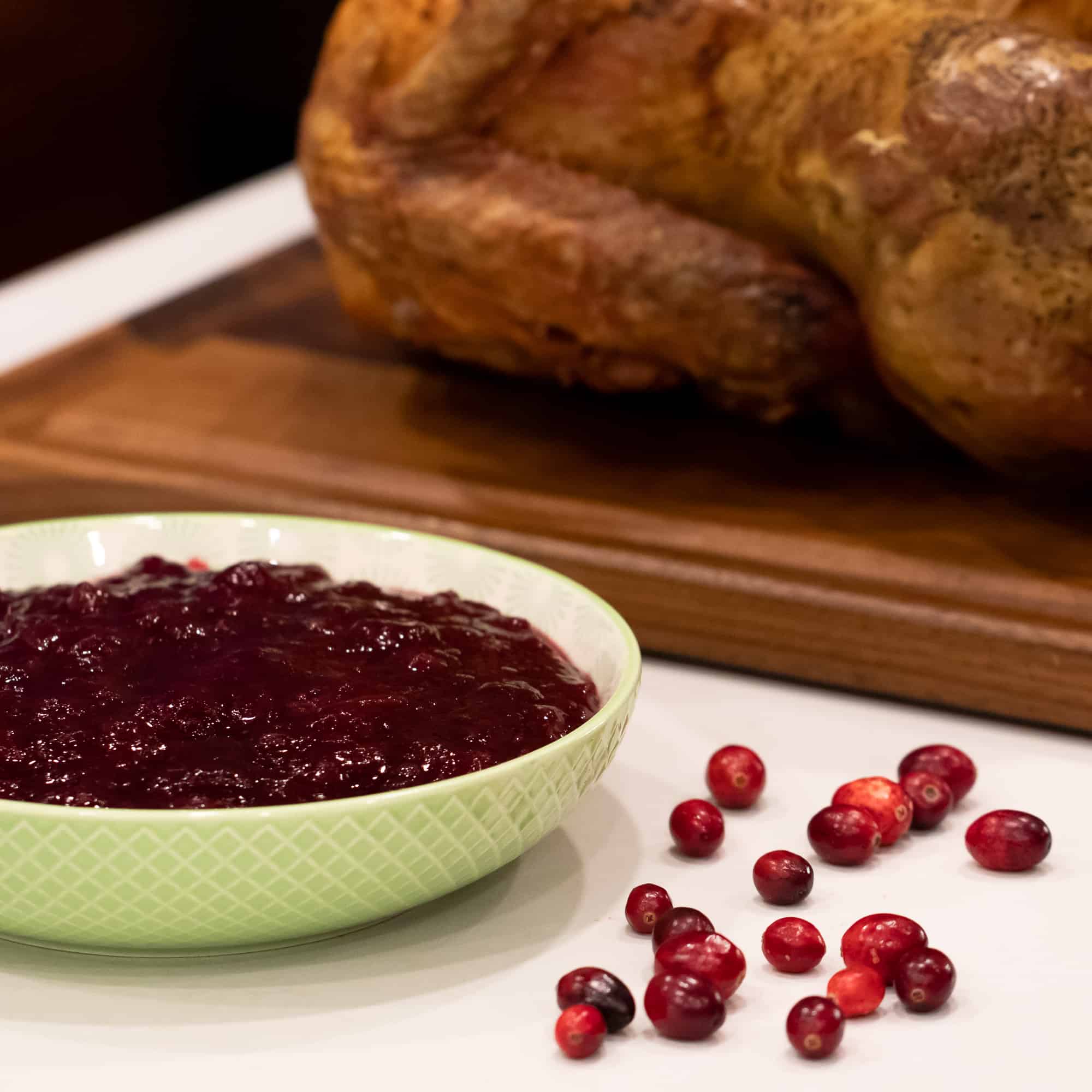 Easy recipe and instructions for how to make homemade cranberry sauce with fresh cranberries. Perfect condiment for thanksgiving or christmas turkey dinner!