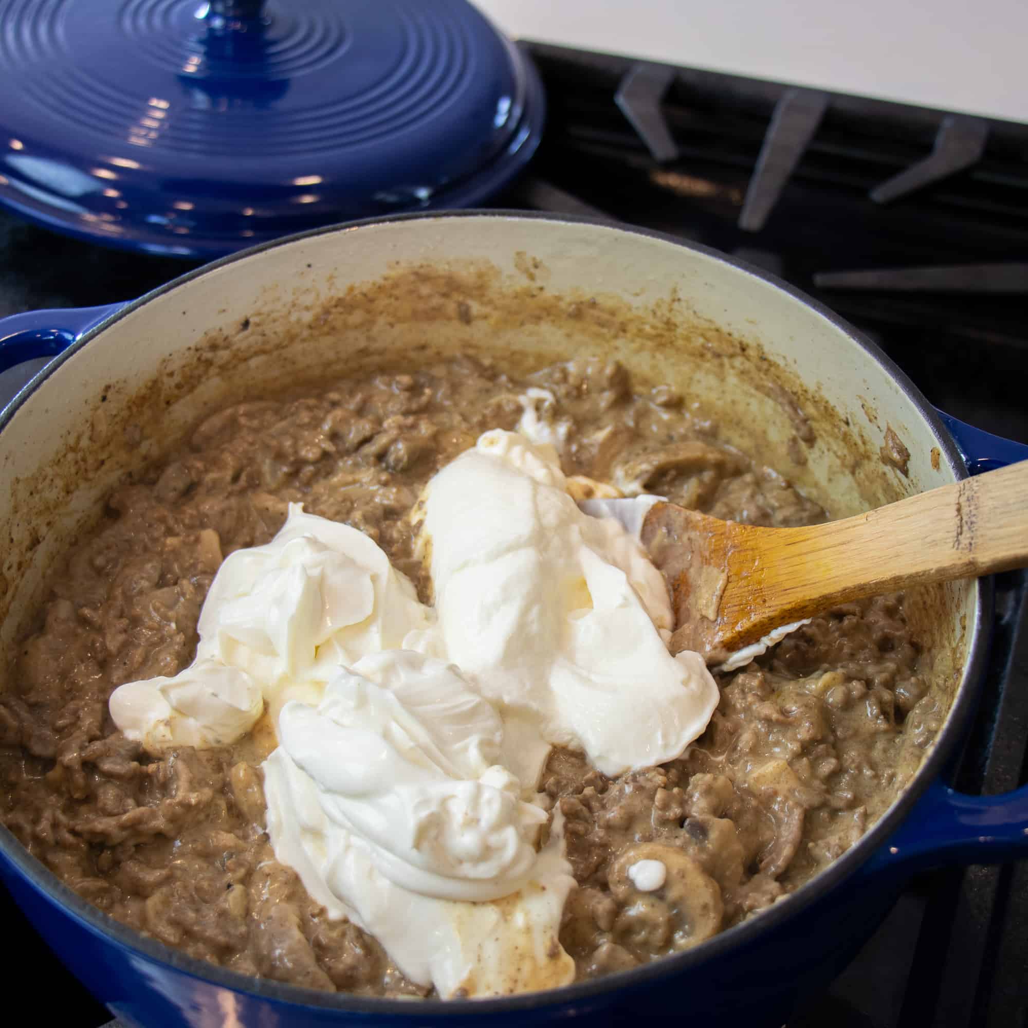 Add the sour cream to the pot and stir until smooth.