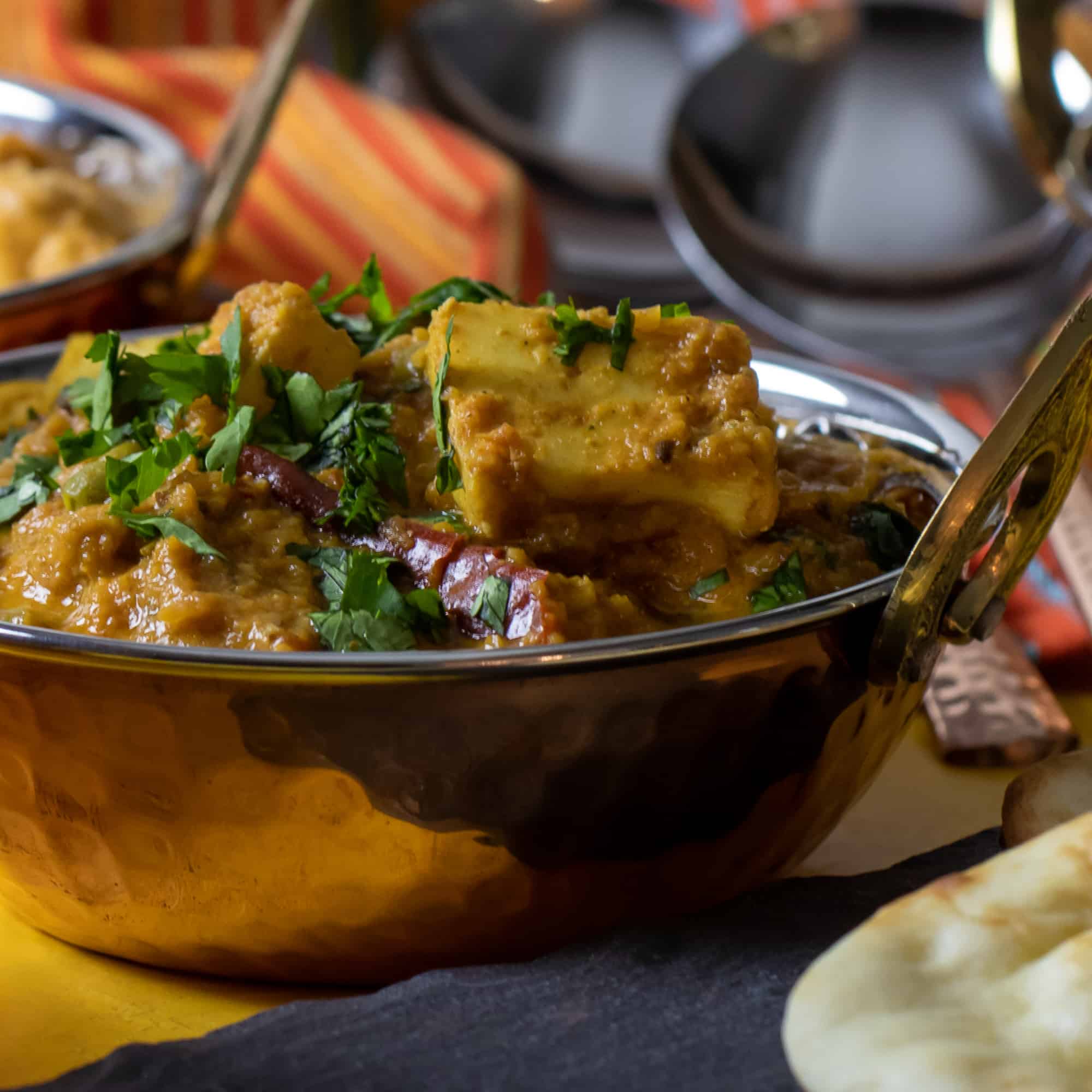 A bowl of Indian matar paneer.