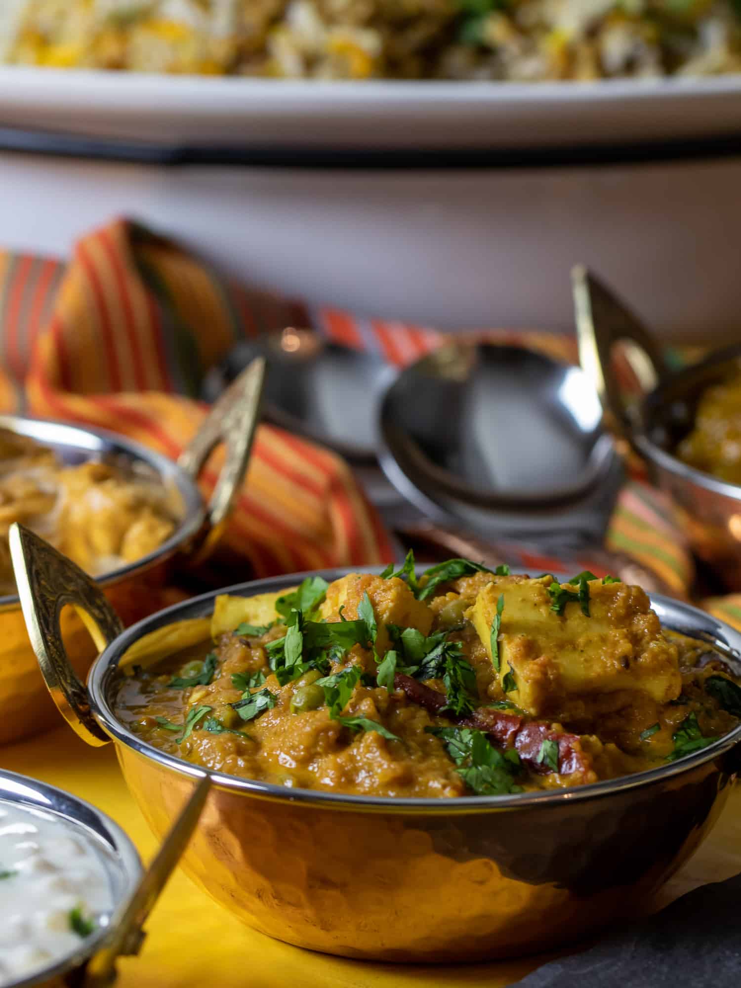 A serving of matar paneer indian curry of peas and paneer cheese.