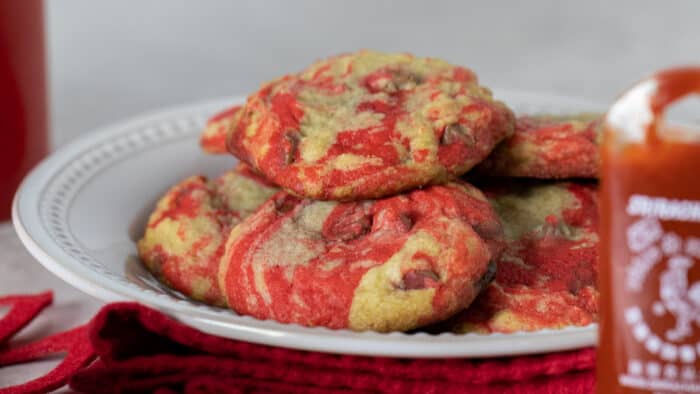 A plate of cookies on a napkin.