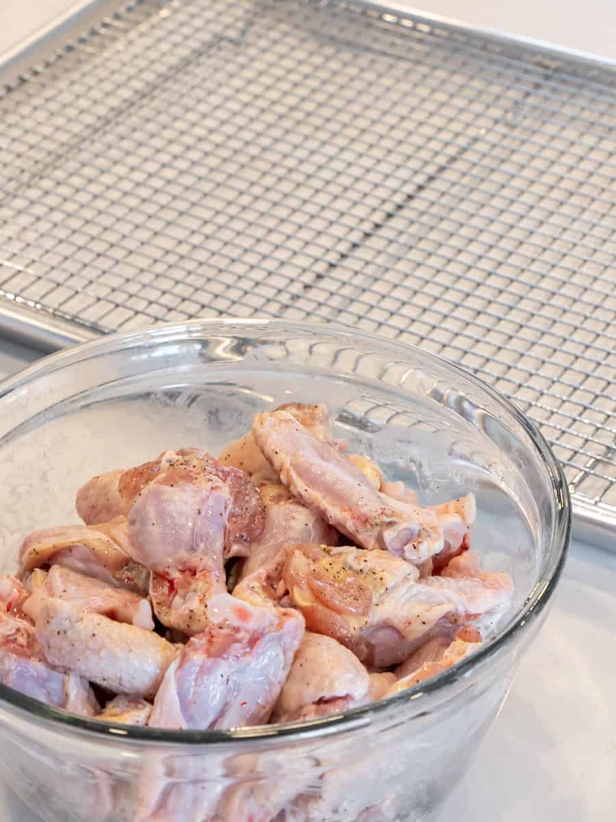 Raw wings tossed with seasoning.